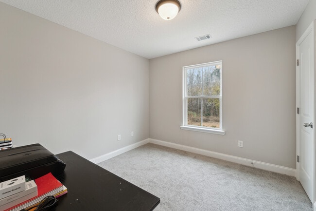 Building Photo - 601 Meloney Dr