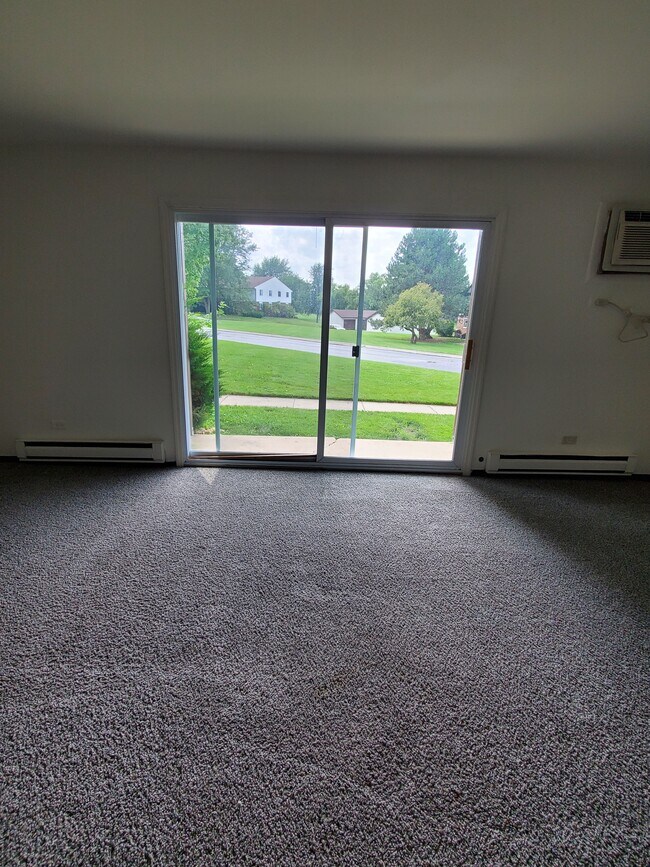 Look!!! Walk out to green grass and a patio - 1023 Shagbark Ct