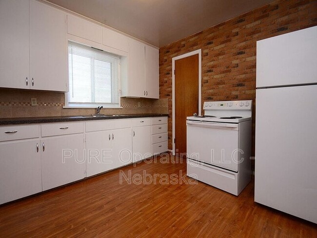 Building Photo - 210 N 32nd Ave