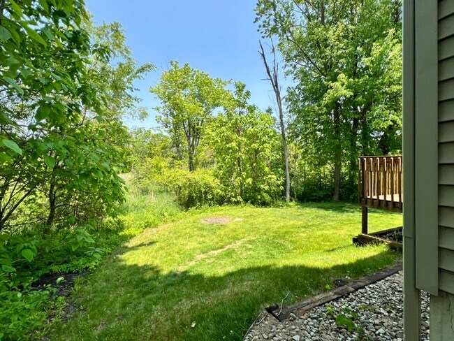 Building Photo - Spacious 3BR Duplex with Finished Basement & 2-Car Garage in Otsego