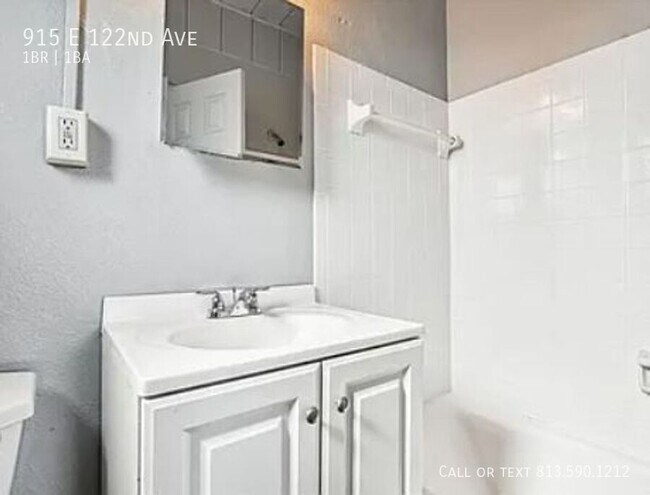 Building Photo - 915 E 122nd Ave