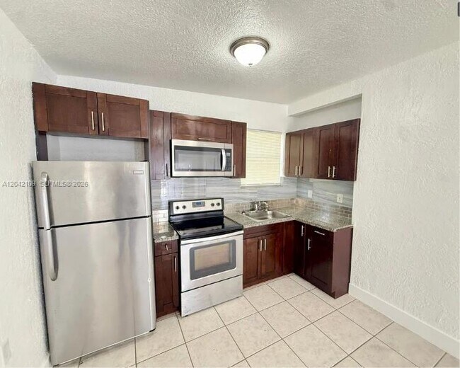 Building Photo - 1345 NW 55th St
