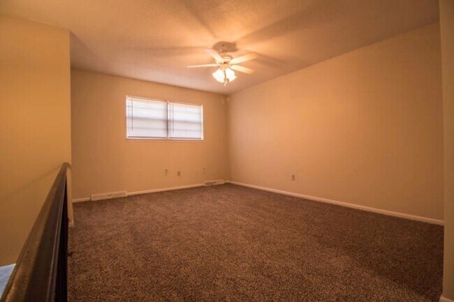 Building Photo - Two Level Duplex with Fenced Yard