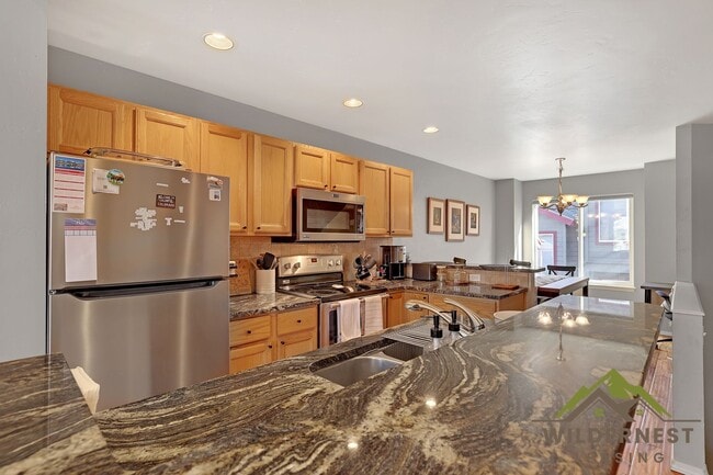 Building Photo - WINTER RENTAL, Utilities included- Gorgeous Townhome with Garage