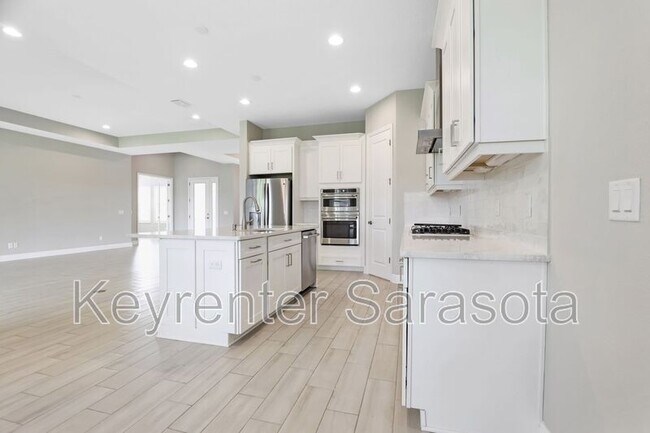 Building Photo - 6133 Lungo Lago Dr
