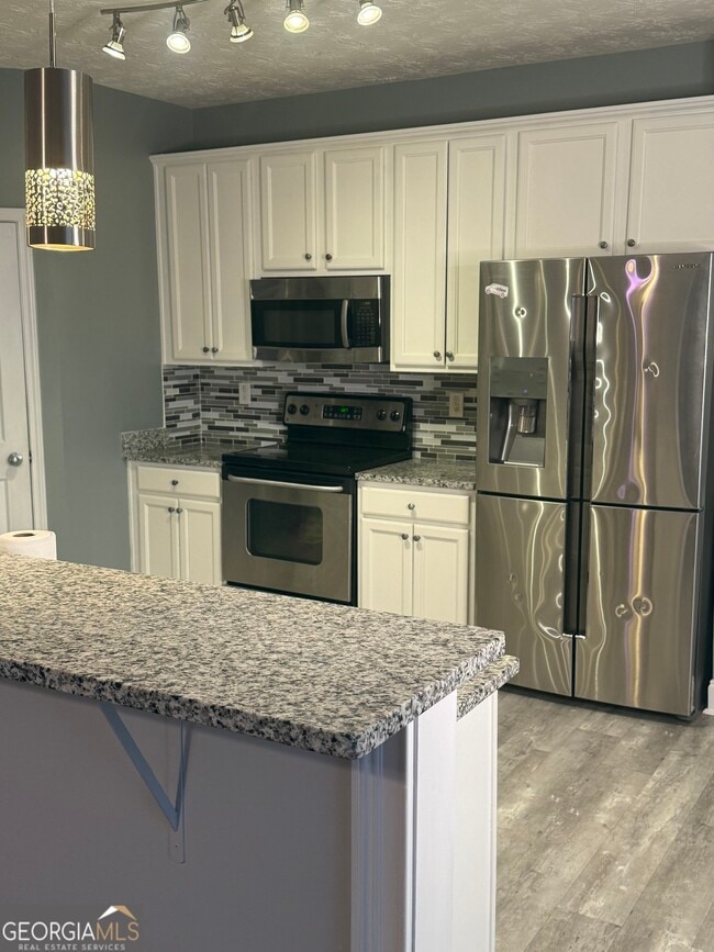 Building Photo - 1221 River Rush Ln NE