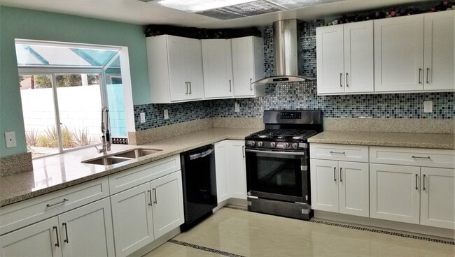 Building Photo - 4 Bedrooms, 3 Baths, 2,809 sq. ft. Home in Canoga Park