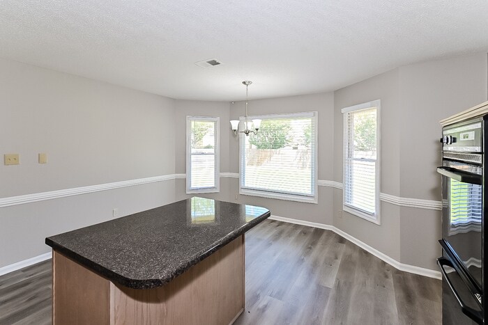 Building Photo - 9008 Country Leaf Cove