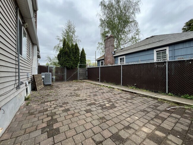 Building Photo - Character-Filled Concordia Home with Flexible Living Spaces & Gas Fireplace