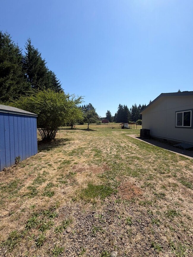 Building Photo - 2.5 Acres with Barn across from Lacomb School!
