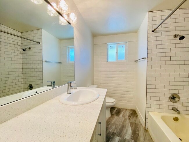 Building Photo - Modern living in this completely updated 2...