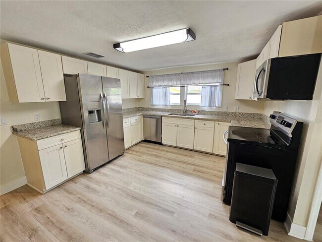 Building Photo - 2436 Arapaho St