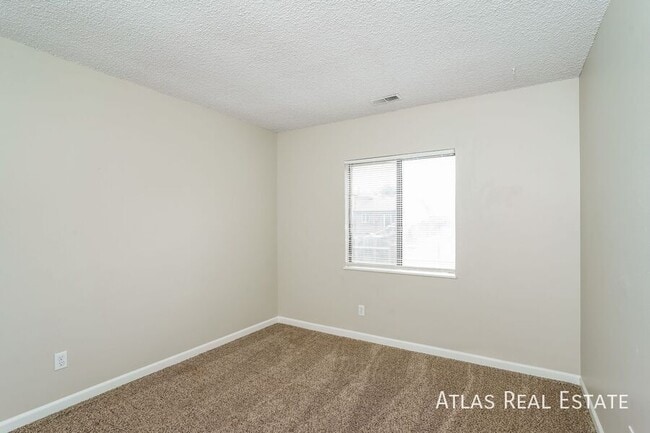 Building Photo - 4465 E Pikes Peak Ave