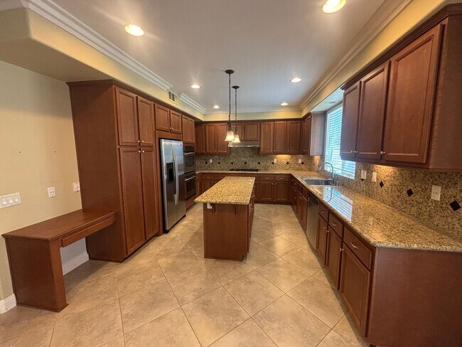 Building Photo - Spacious 4-Bedroom Home with Community Ame...