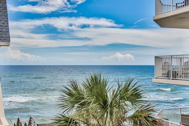 Building Photo - 50% off first months rent.  Gulf front com...