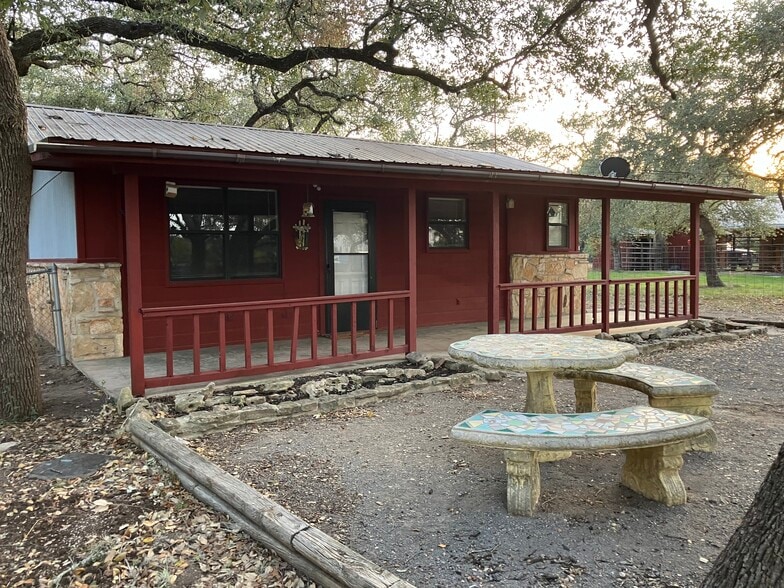 Relax and take in the views from your covered porch - 20681 FM306