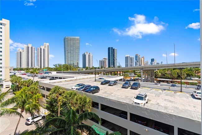 Building Photo - 19390 Collins Ave