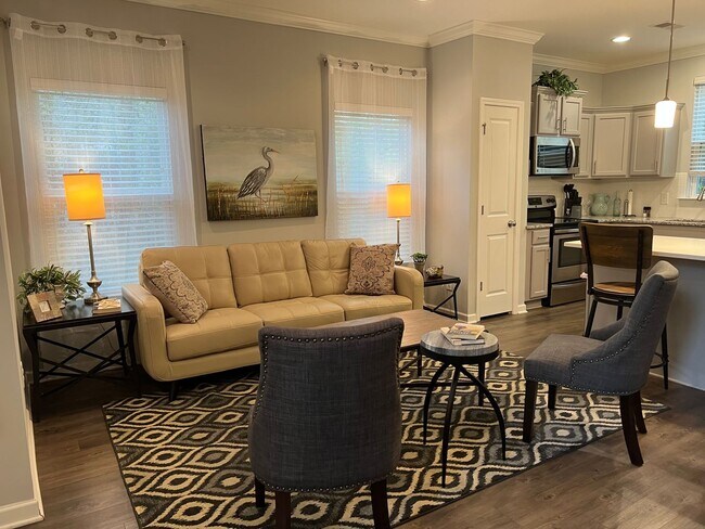Building Photo - FURNISHED Three Bedroom Wellstone Model Home