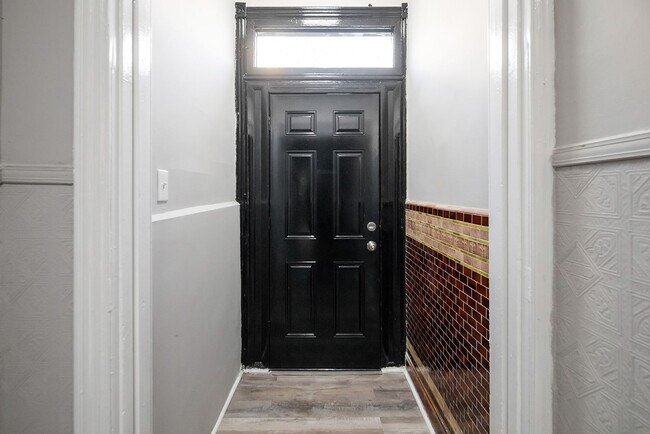 Building Photo - Renovated 4-Bedroom Home with Modern Finishes