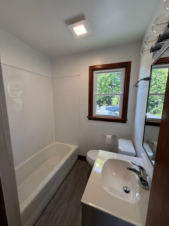 Building Photo - Charming 4-Bedroom Cape Cod Home with Spacious Yard & Storage
