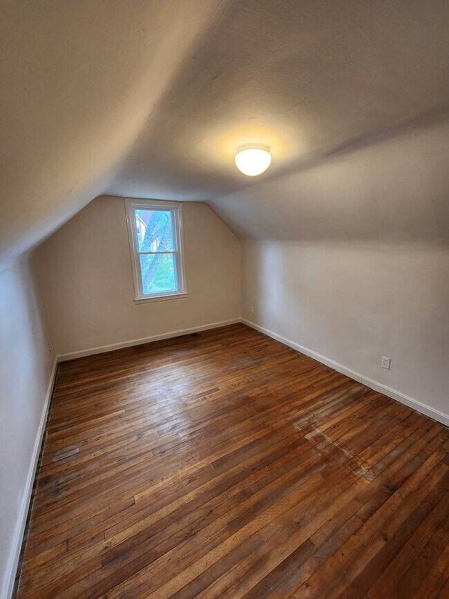 Building Photo - Move-In Special: Save $300 on This Charmin...