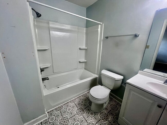 Building Photo - Three-bedroom, two-and-a-half bathrooms in...