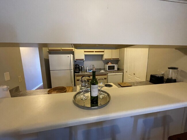 Building Photo - For Lease - Fully Furnished 2 BR | 1.5 BA Townhome in PCB!