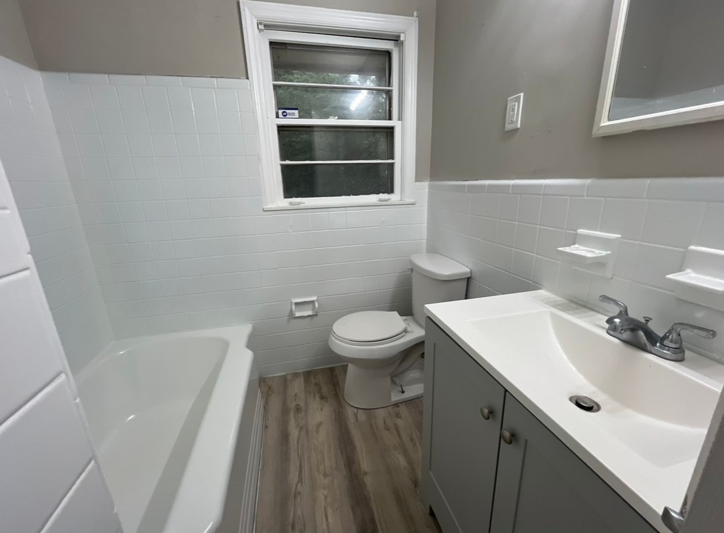 Building Photo - COMING SOON: Classic charm, peaceful living, your Forest Park retreat awaits in this spacious 3-b...