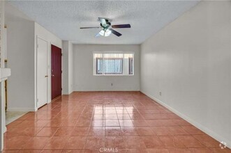 Building Photo - Exceptional 2 Br 2 Ba Condominium in Gated...