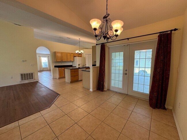Building Photo - Available Now! Spacious 4-Bedroom, 2-Bath ...