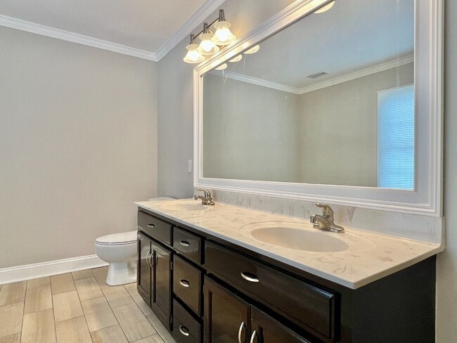 Building Photo - SPACIOUS INSIDE AND OUT!