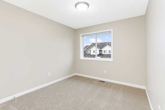 Building Photo - Otsego Townhome for RENT 3bd3ba2gar INTERIOR UNIT available May 01