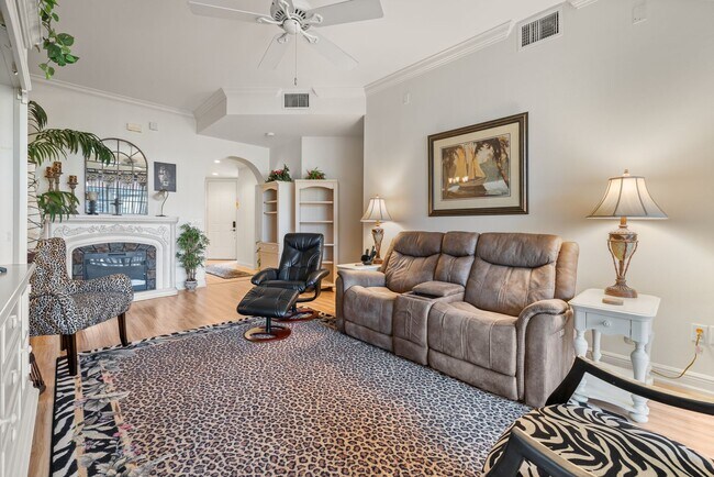 Building Photo - Experience Bell Tower Park. GATED ground floor 2 Bed 2 Bath Den 1 Car Garage Condo.