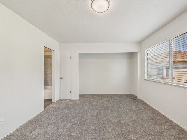 Building Photo - Updated 2 Bed / 1.5 Bath Townhome – In-Unit Washer & Dryer + Garage Parking – $2,800/month