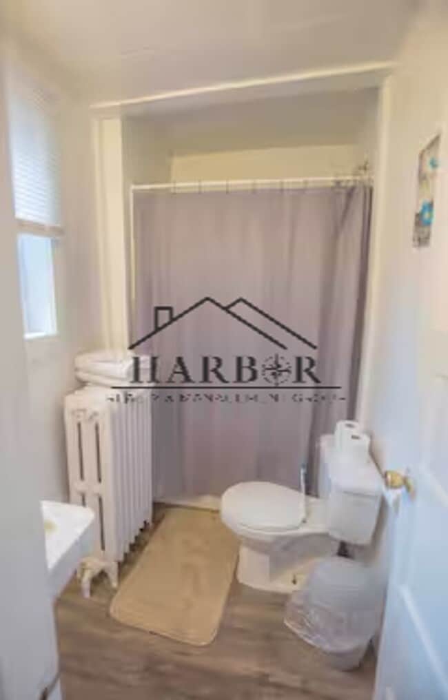 Building Photo - Modern Minimalism: Efficient 1-BR in a Top-Tier Location