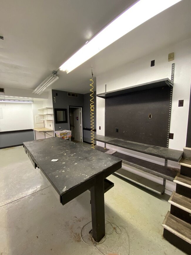 Building Photo - 1-Bedroom Home with 3-Stall Garage and Bonus Living Space