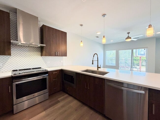 Building Photo - Stylish East Austin Condo with Modern Finishes, Open Living, and Luxury Primary Retreat