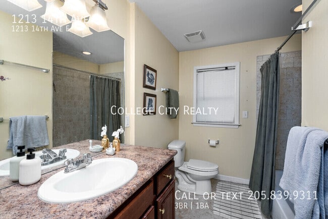 Building Photo - 1213 14th E Ave