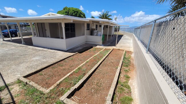 Back corner of the property. Possible garden? - 2342 Ahakuka Pl