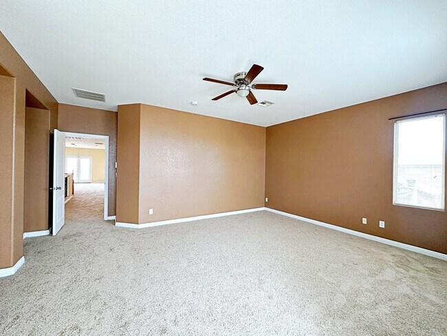 Building Photo - 4 BEDROOM HOME 3 CAR GARAGE ON A CORNER LO...