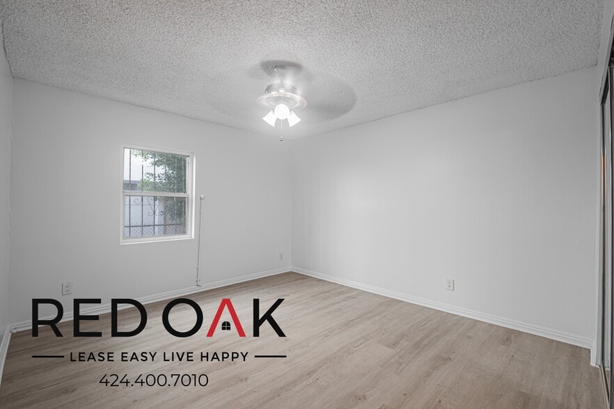 Building Photo - 1309 W 36th Pl