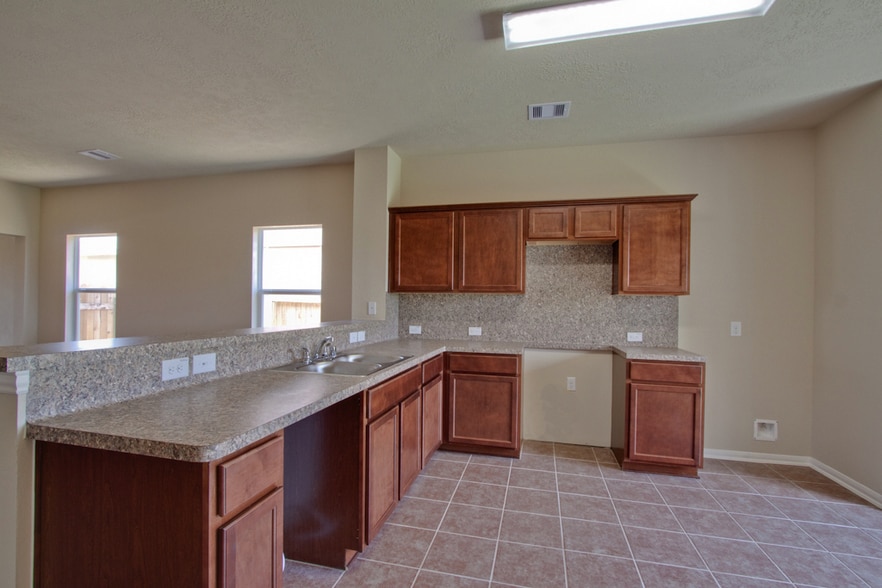 Images attached are of similar homes, not this one. This one will have white 42 inch cabinets. The home is currently still under construction and is scheduled to be completed by the middle of March. Seeking tenant who wants to move in during the month of March. Please contact agent for more info. - 17004 Arcata Avenue