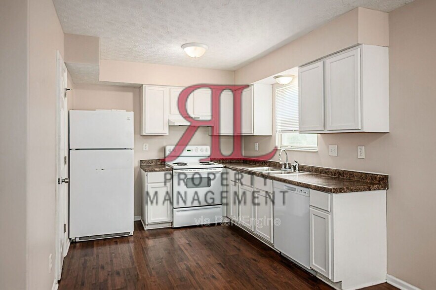 Building Photo - 7179 Feather Ct