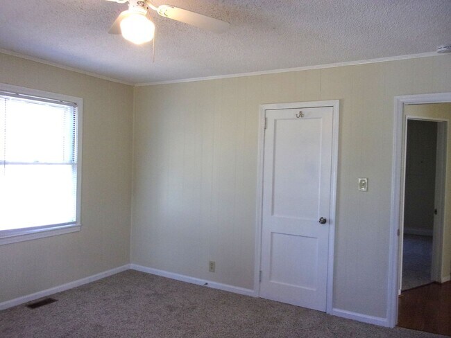 Building Photo - Recently Updated with Large Backyard and Deck