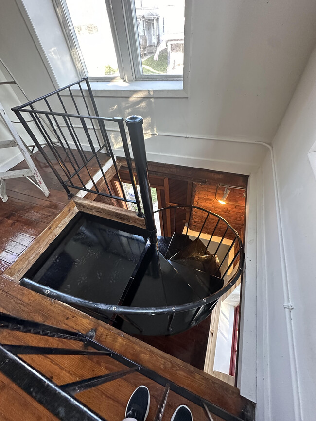 second floor spiral staircase going down - 37 Union St