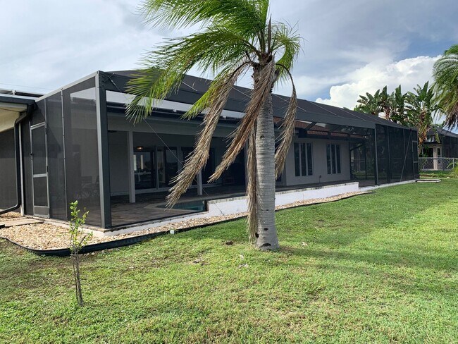 Building Photo - AVAILABLE 2027 SEASON! ! PGI HEATED POOL, WATERFRONT, BOAT LIFT
