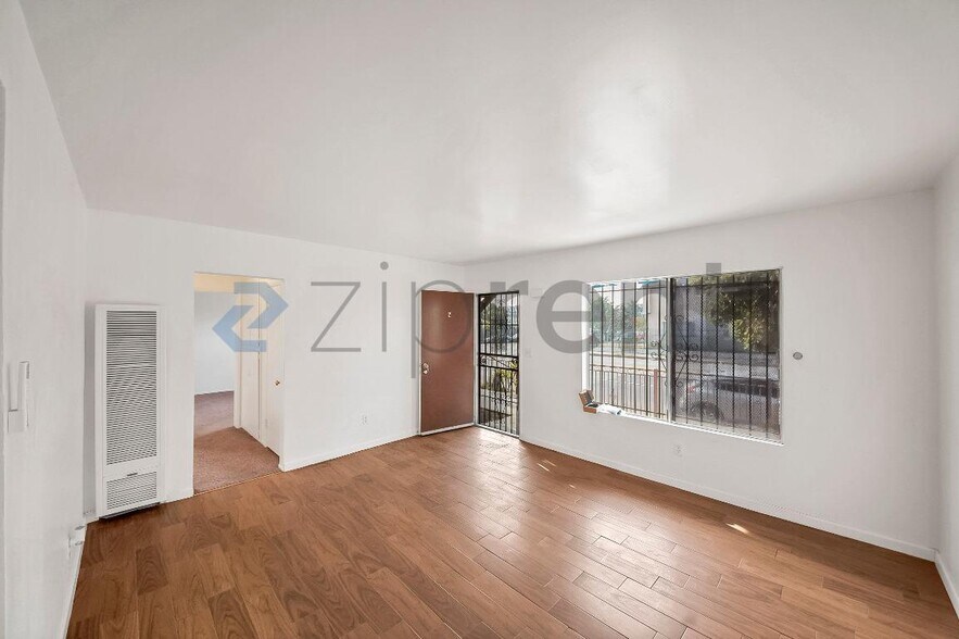 Building Photo - 2458 Normandie Ave