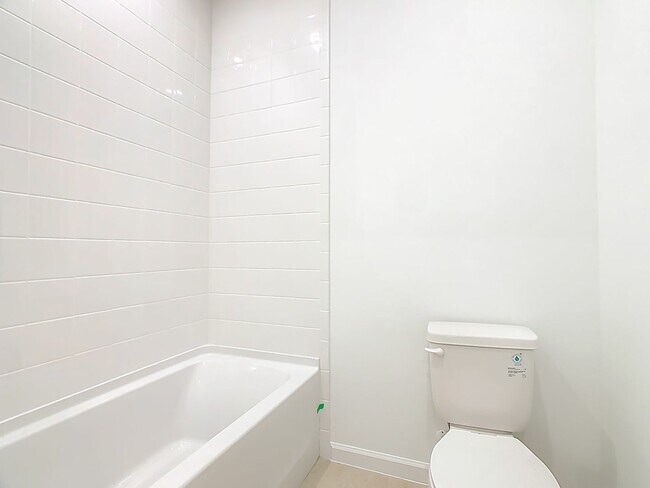 Building Photo - New Luxury Townhome in Celebration, FL Corner unit.  All porcelain tiled floors.  Aleutian model ...