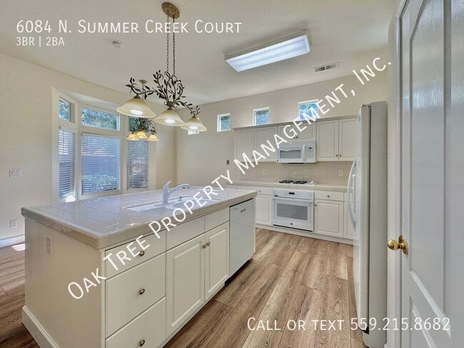 Building Photo - 6084 N Summer Creek Ct