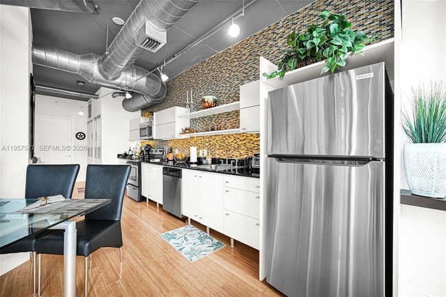 Building Photo - 690 SW 1st Ct